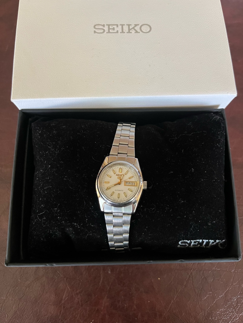 Seiko 5 Silver Watch with Cream Dial and Gold Accents - Picture 2 of 3